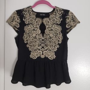 Lace embellished peplum top